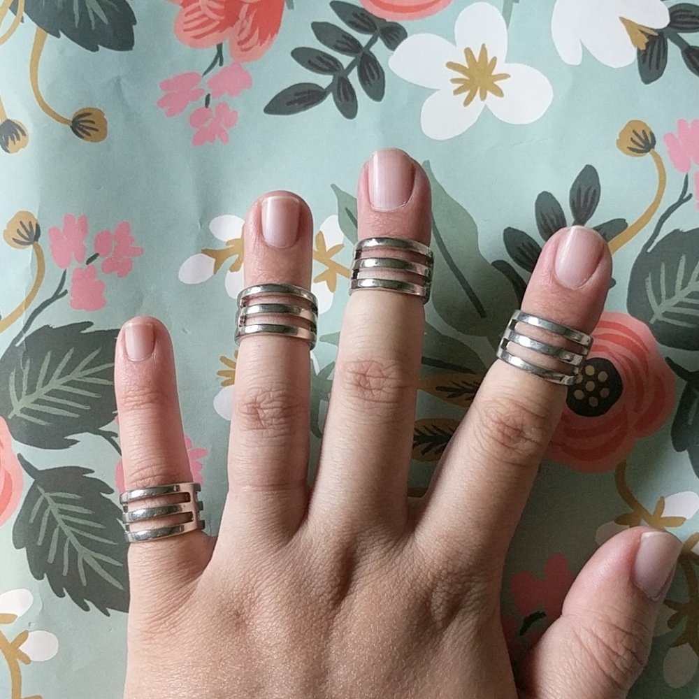 Silver nwot size 5 set of 4 rings